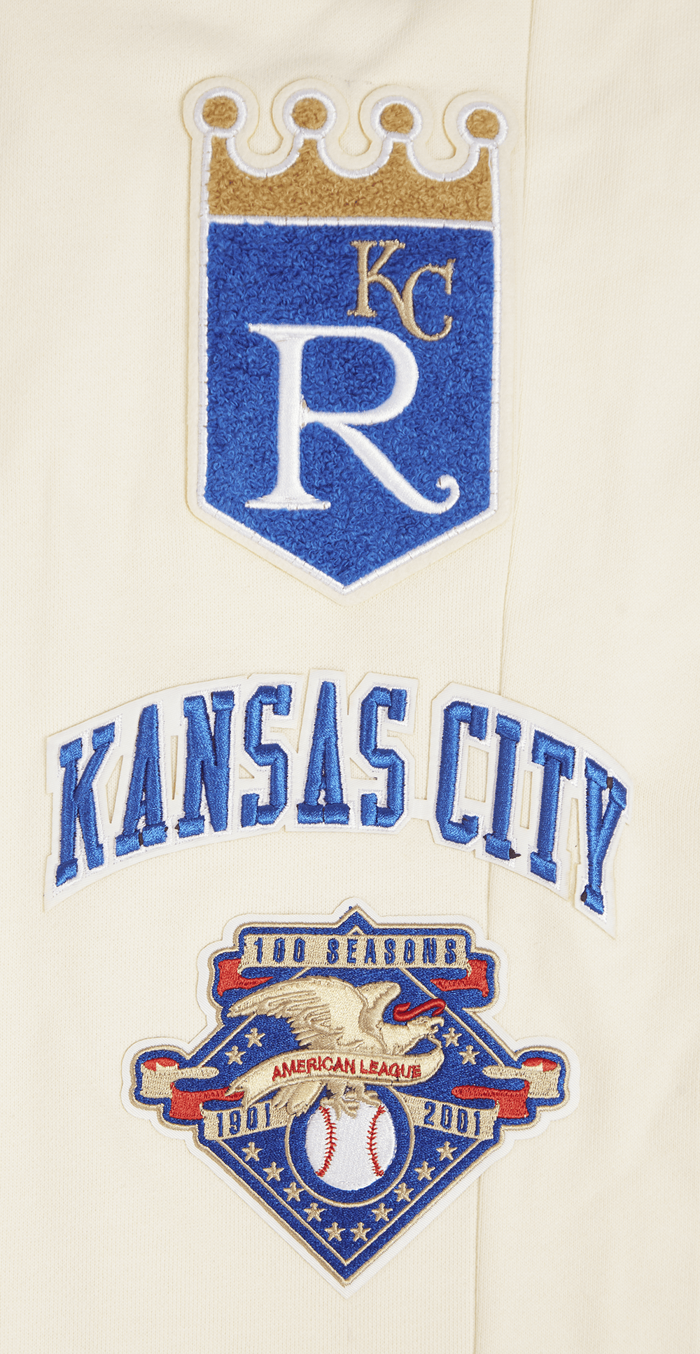 PANTALÓN DE CHÁNDAL RETRO CLÁSICO PARA HOMBRE MLB KANSAS CITY ROYALS (BLANCO HUESO/ AZUL UNIVERSITARIO)