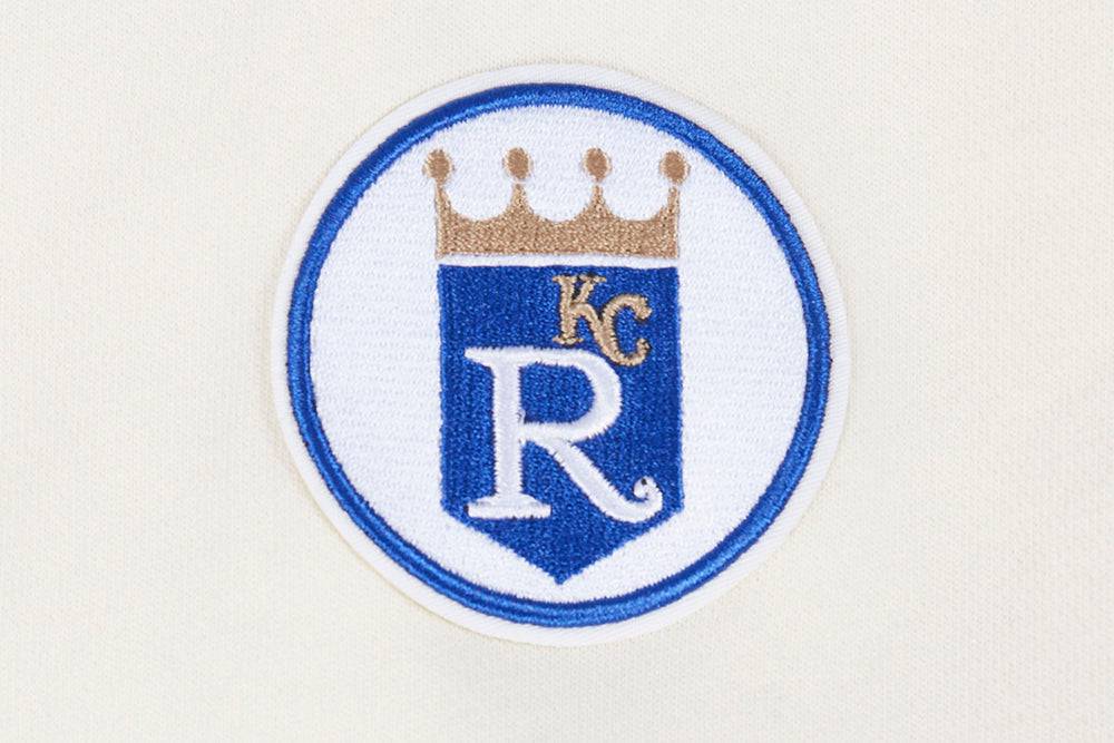SUÉTER DE CUELLO REDONDO RETRO CLÁSICO PARA MUJER MLB KANSAS CITY ROYALS (BLANCO HUESO/ AZUL UNIVERSITARIO)
