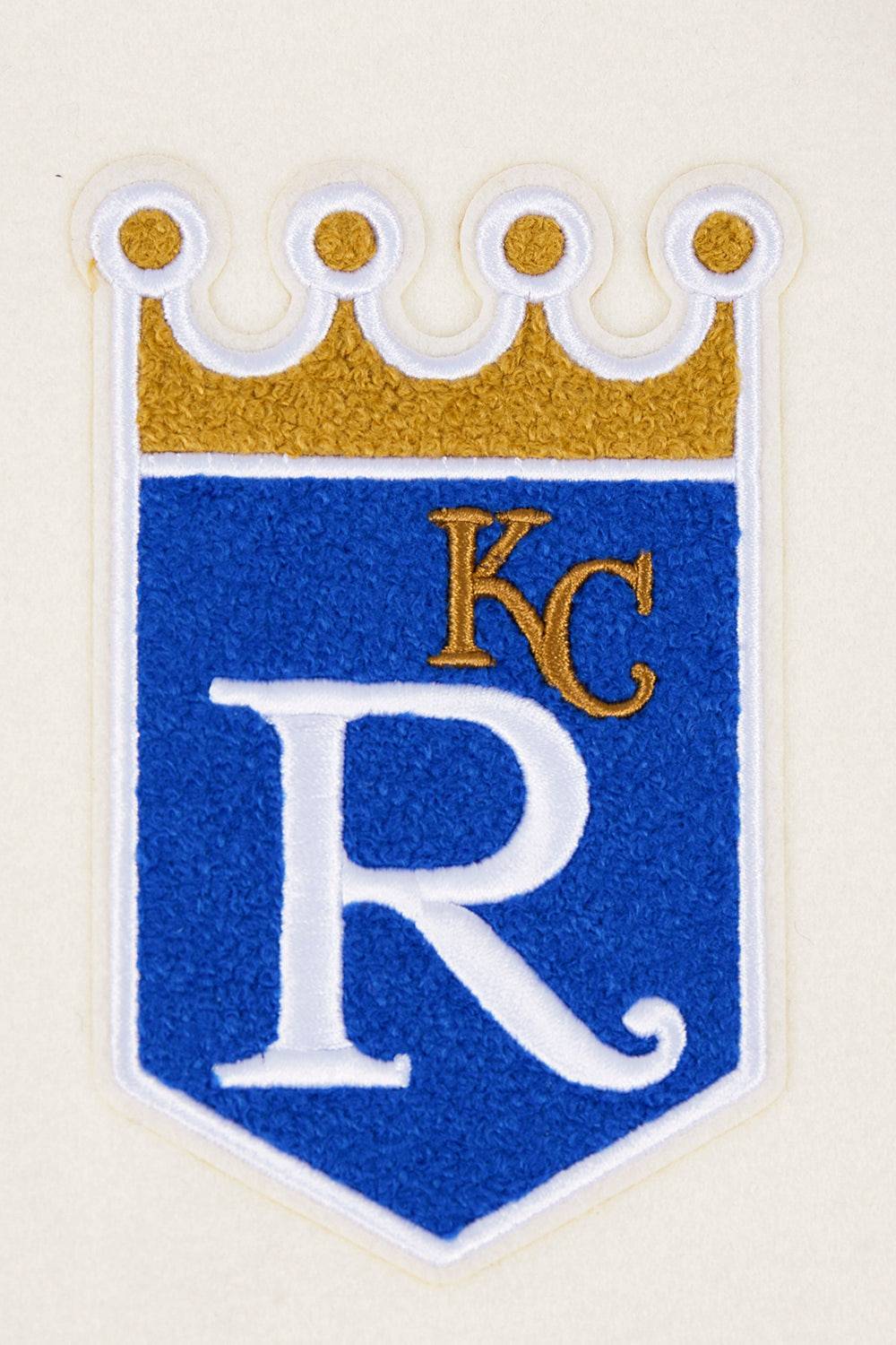 CHAQUETA UNIVERSITARIA RETRO CLÁSICA DE LANA ACANALADA PARA MUJER MLB KANSAS CITY ROYALS (BLANCO HUESO/ AZUL UNIVERSITARIO)