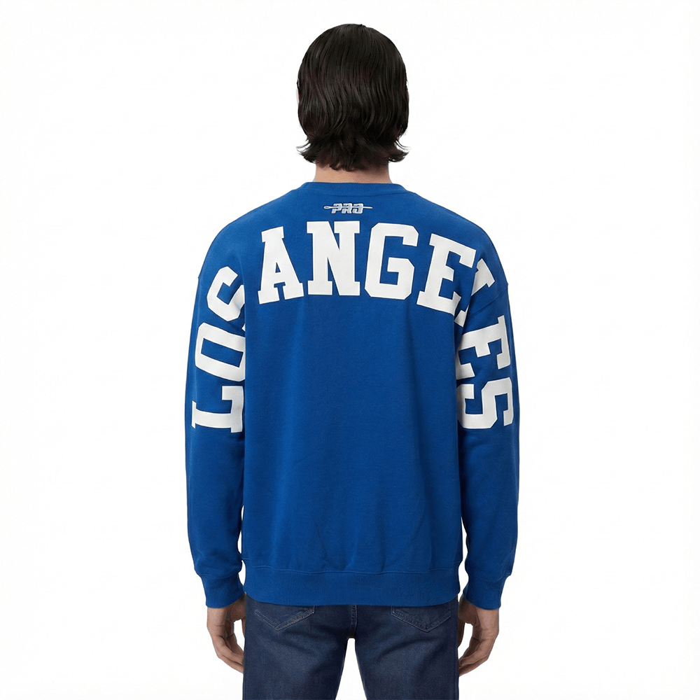 MLB LOS ANGELES DODGERS WINGSPAN SUECA DE FORRO POLAR CON CUELLO REDONDO Y HOMBROS CAÍDOS PARA HOMBRE (AZUL DODGER)